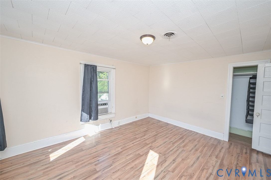 17519 New Baltimore Road Milford, VA 22514 - Photo 27 of 38 wooden floor in an empty room with a window