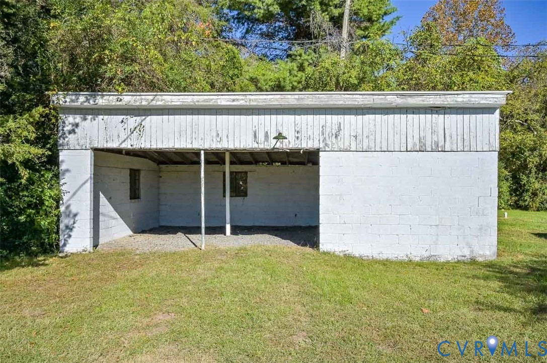 17519 New Baltimore Road Milford, VA 22514 - Photo 34 of 38 a house with trees in front of it
