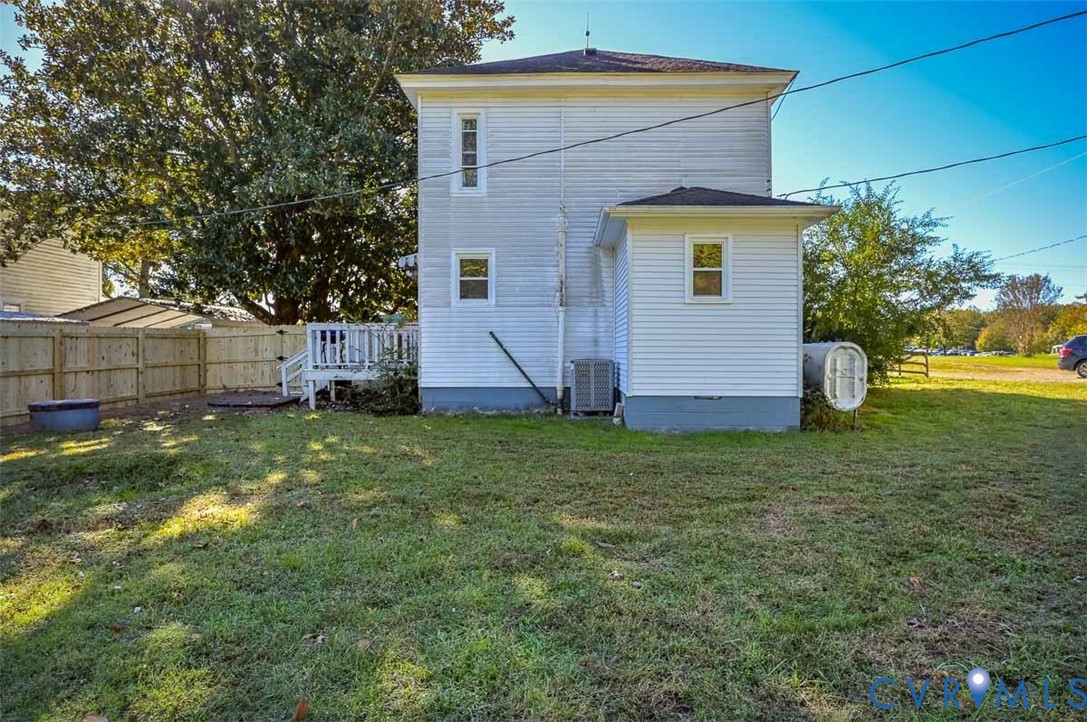 17519 New Baltimore Road Milford, VA 22514 - Photo 36 of 38 a view of a house with a backyard