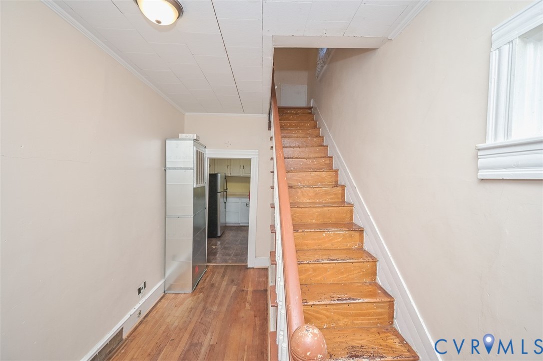 17519 New Baltimore Road Milford, VA 22514 - Photo 8 of 38 a view of a hallway with wooden floor and entryway