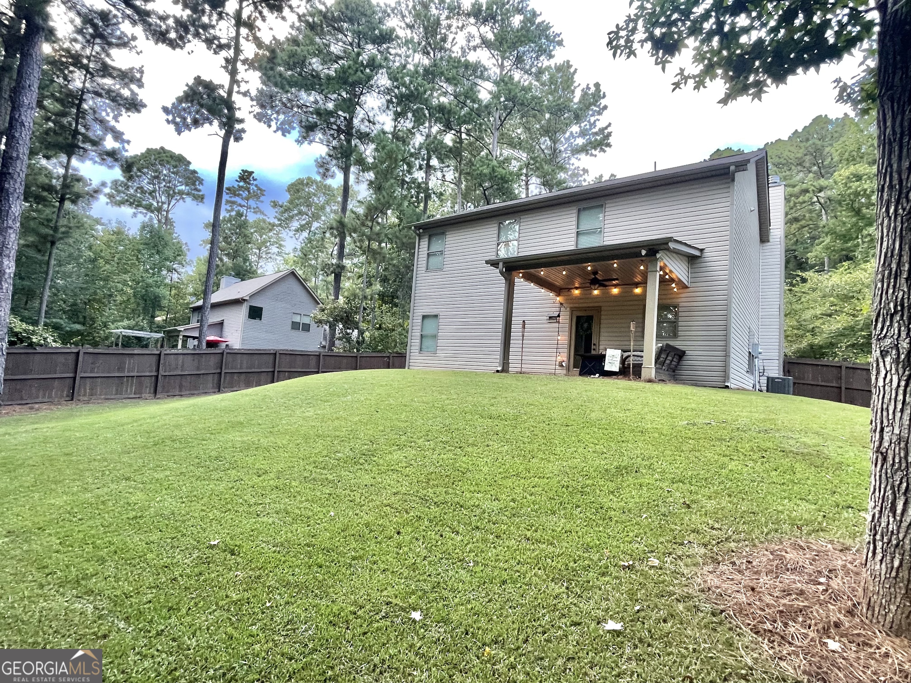 57 Partridge Court Monticello, GA 31064 - Photo 15 of 57 a view of a house with backyard and garden