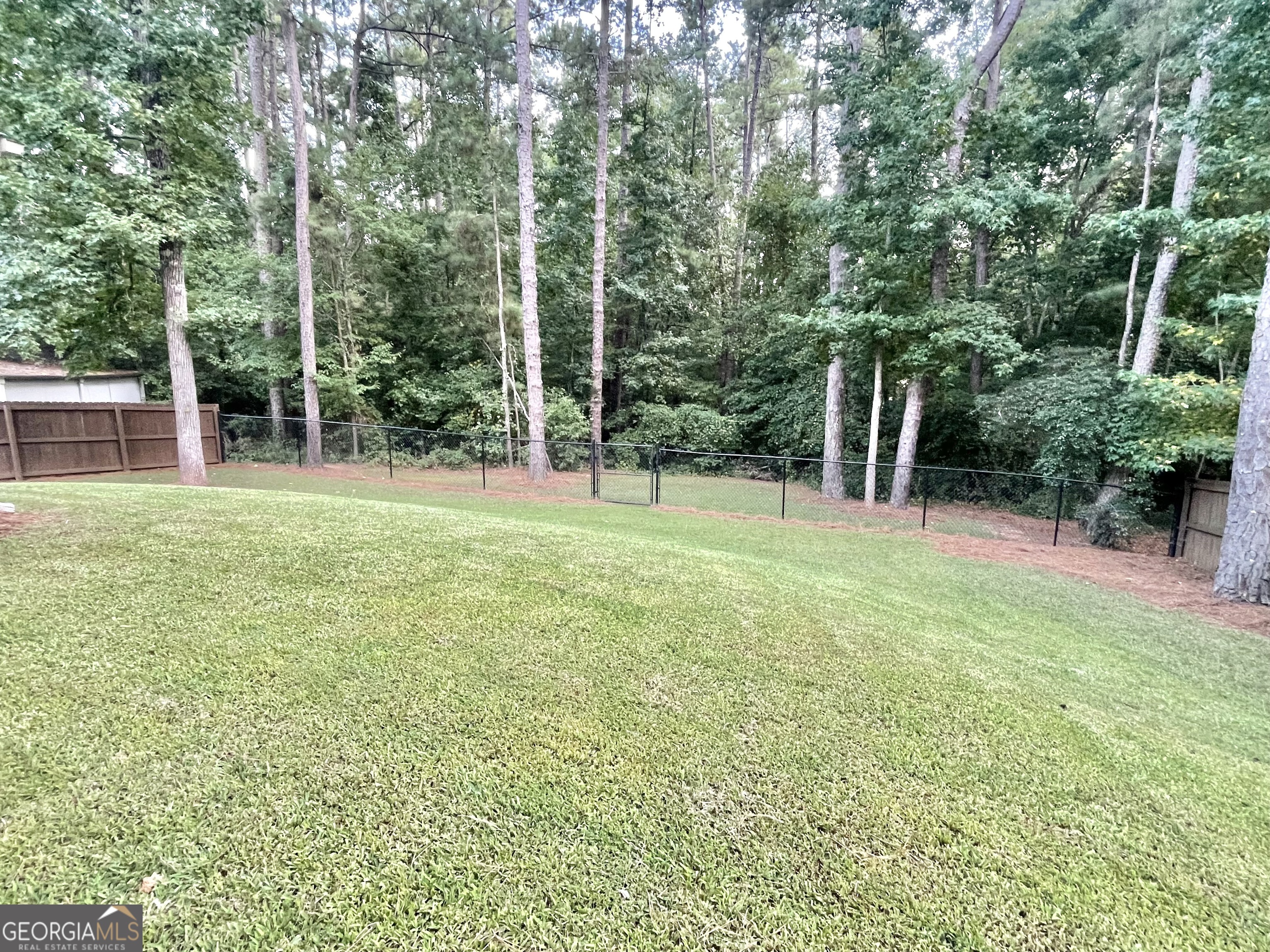 57 Partridge Court Monticello, GA 31064 - Photo 18 of 57 a view of green field with trees in the background