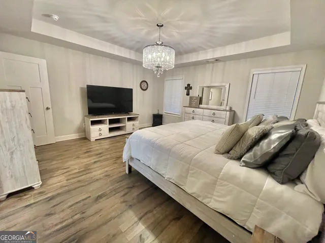 a white bath tub sitting next to a window