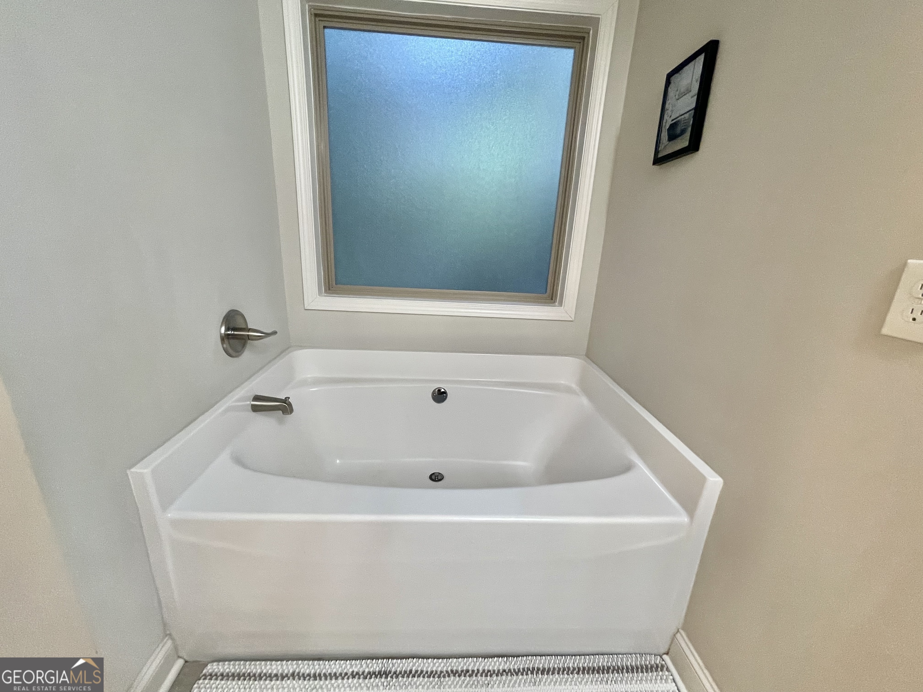 57 Partridge Court Monticello, GA 31064 - Photo 37 of 57 a white bath tub sitting next to a window