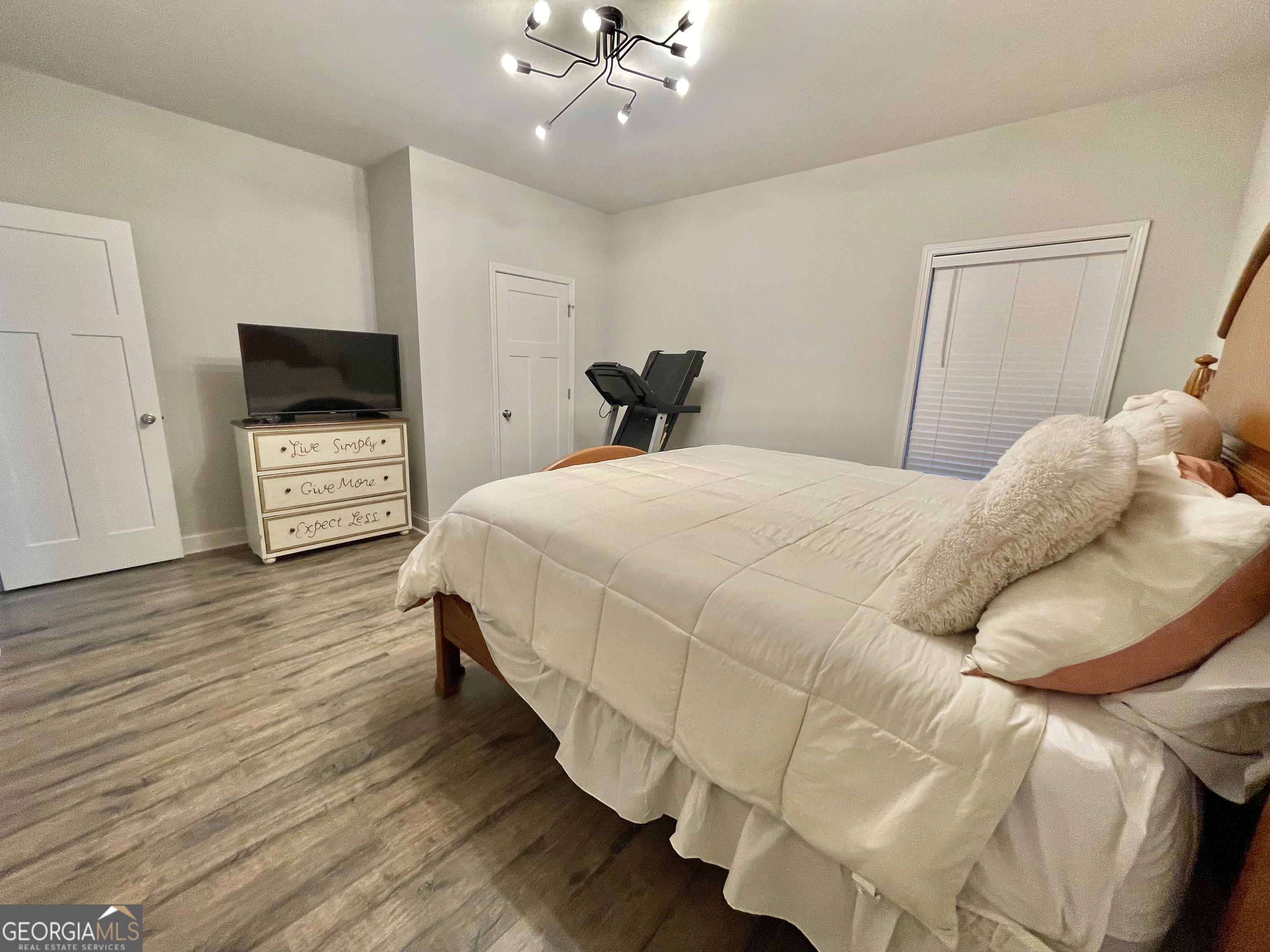 57 Partridge Court Monticello, GA 31064 - Photo 51 of 57 a bedroom with a bed and a flat screen tv