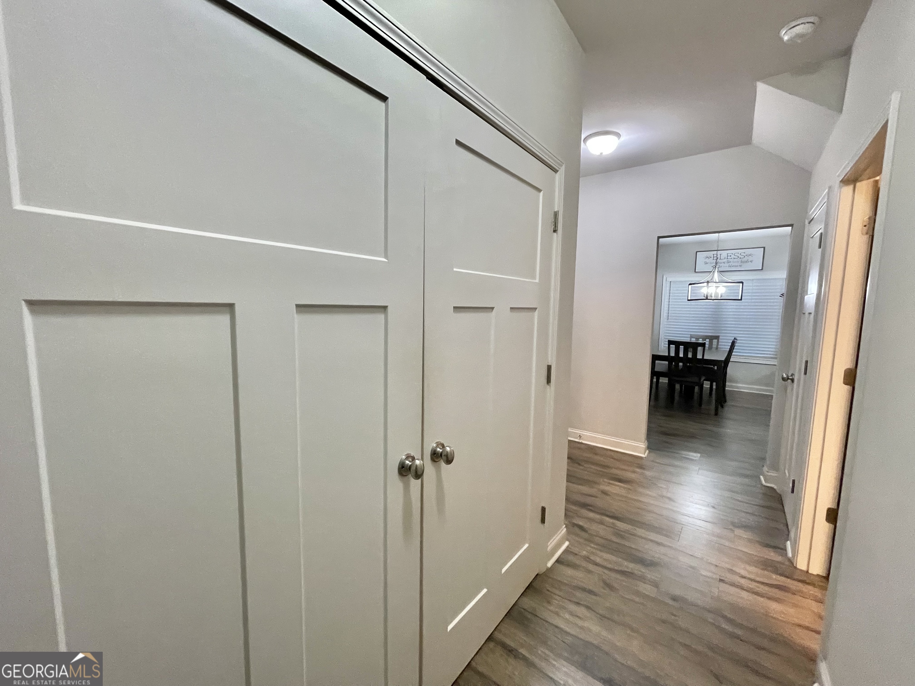 57 Partridge Court Monticello, GA 31064 - Photo 53 of 57 a view of a hallway view with wooden floor and staircase