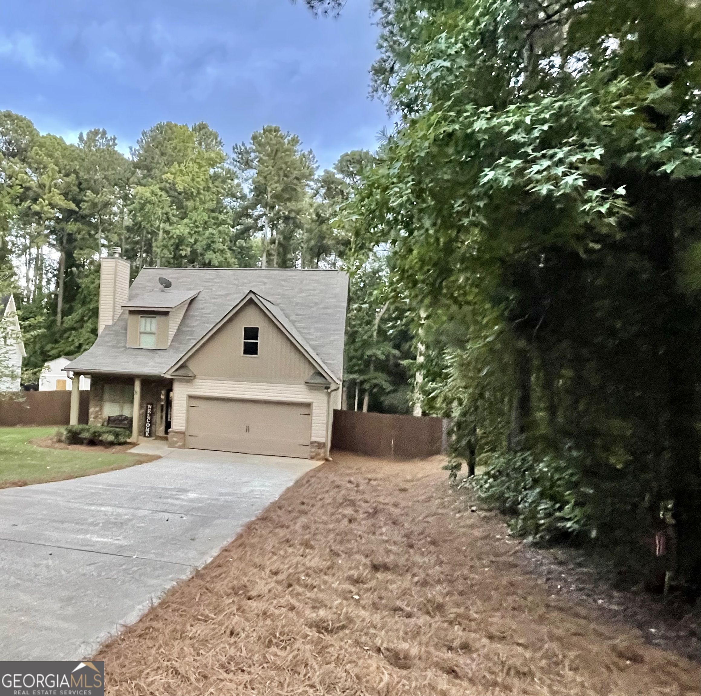 57 Partridge Court Monticello, GA 31064 - Photo 8 of 57 a house with trees in the background