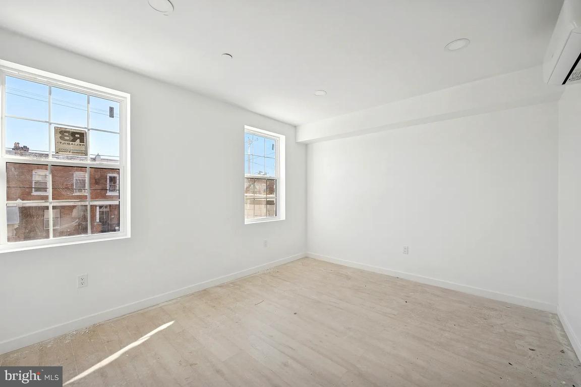 52 North 51st Street, Unit 1 Philadelphia, PA 19139 - Photo 5 of 7 a view of an empty room with a window