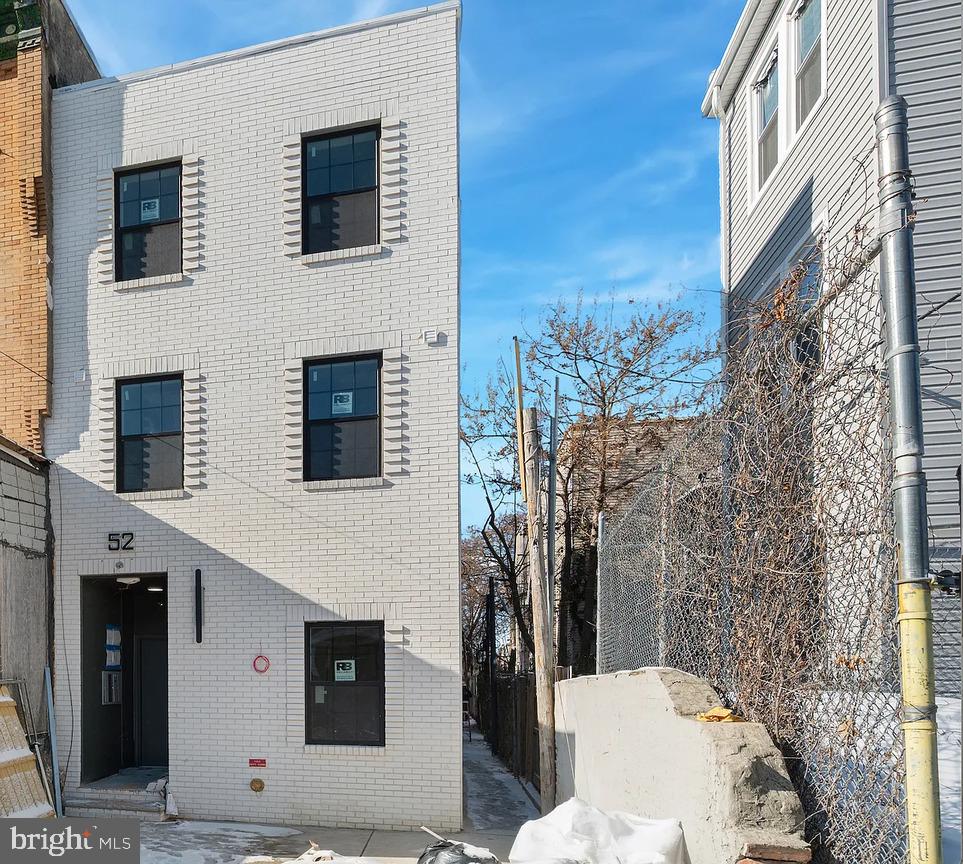52 North 51st Street, Unit 1 Philadelphia, PA 19139 - Photo 6 of 7 a view of a building with a outdoor space