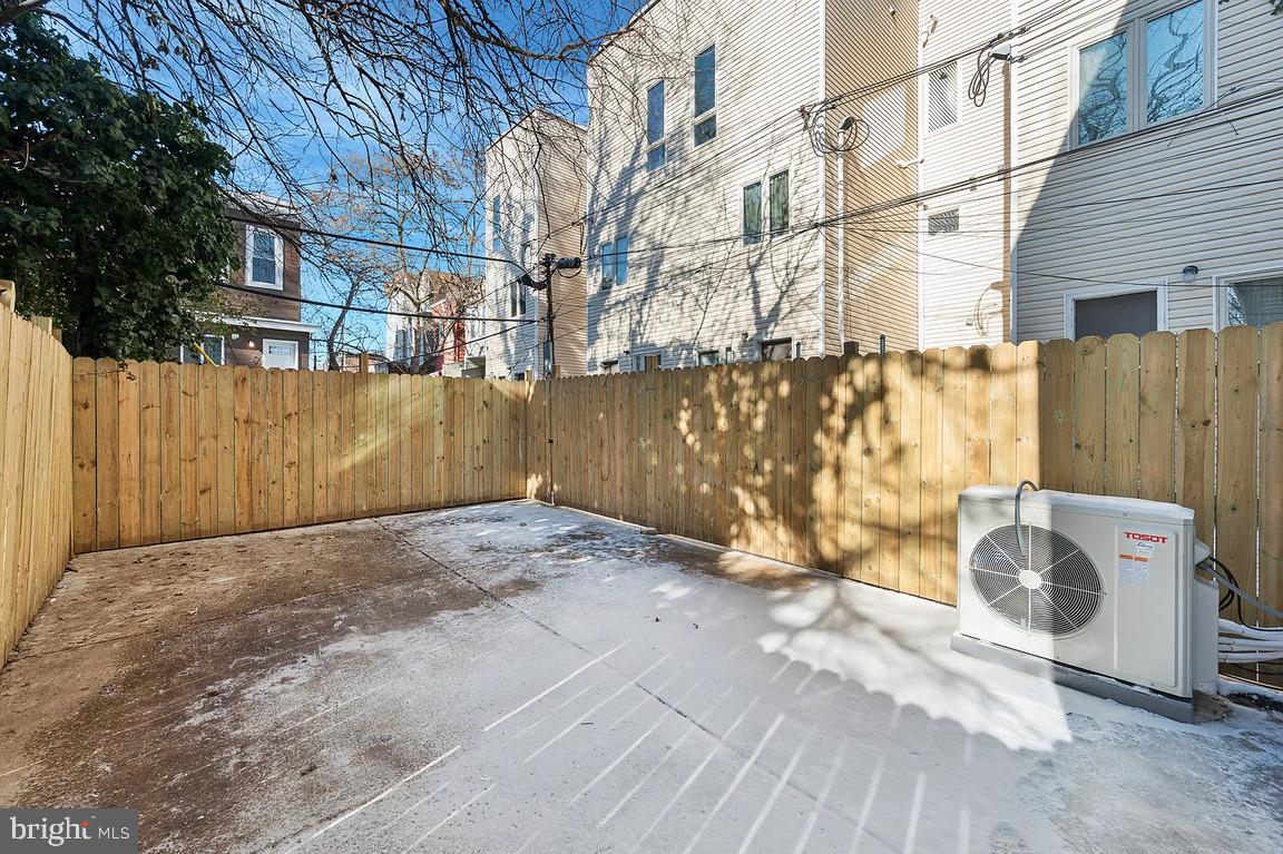 52 North 51st Street, Unit 1 Philadelphia, PA 19139 - Photo 7 of 7 a view of a wooden door with a bench