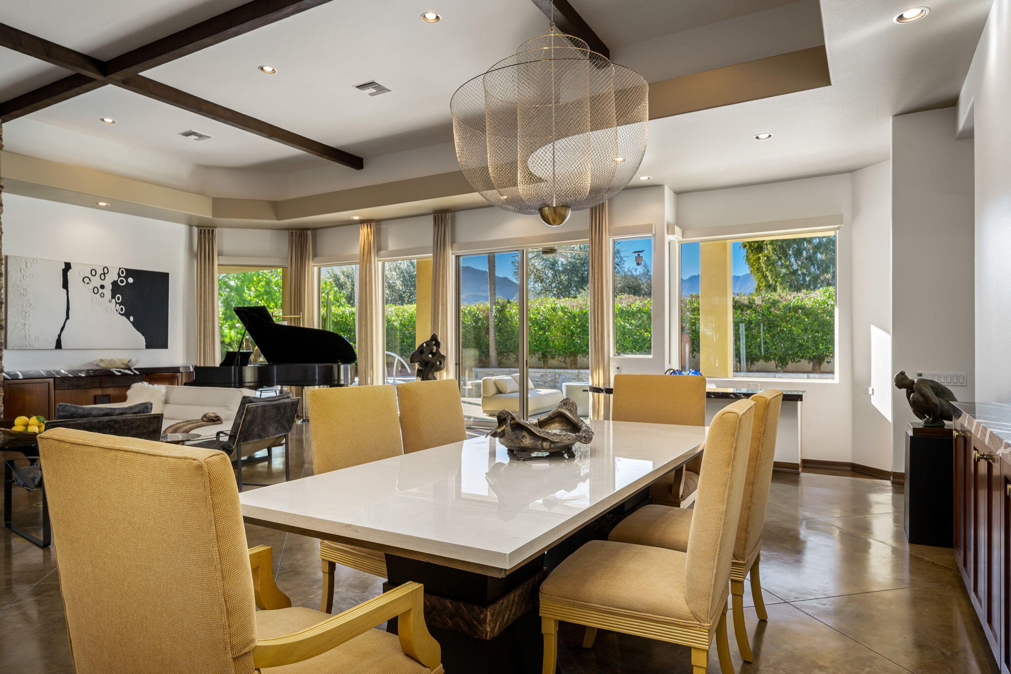 103 Waterford Circle Rancho Mirage, CA 92270 - Photo 11 of 44 a view of a dining room with furniture window and outside view