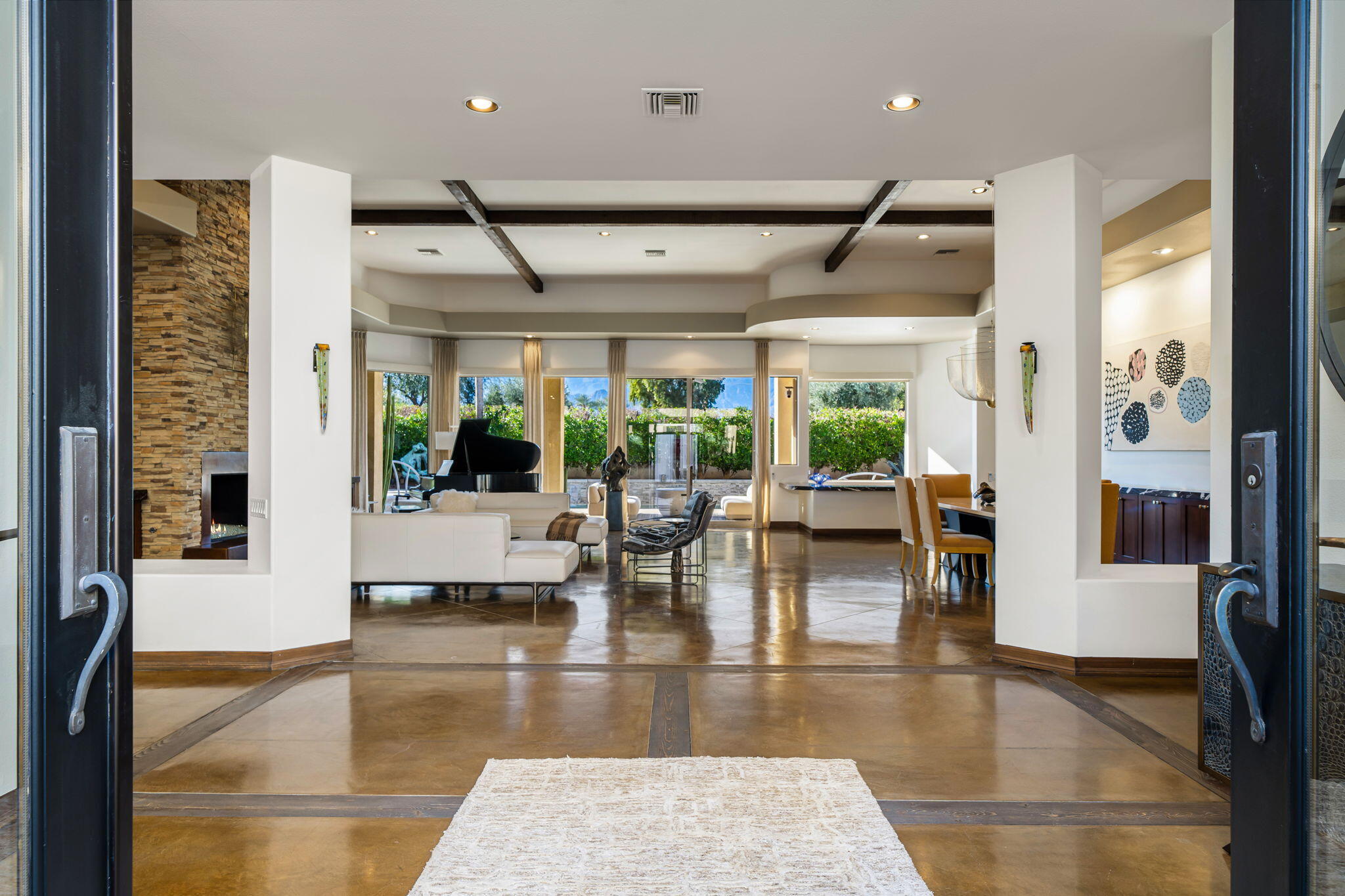 103 Waterford Circle Rancho Mirage, CA 92270 - Photo 3 of 44 a lobby with furniture and a large window