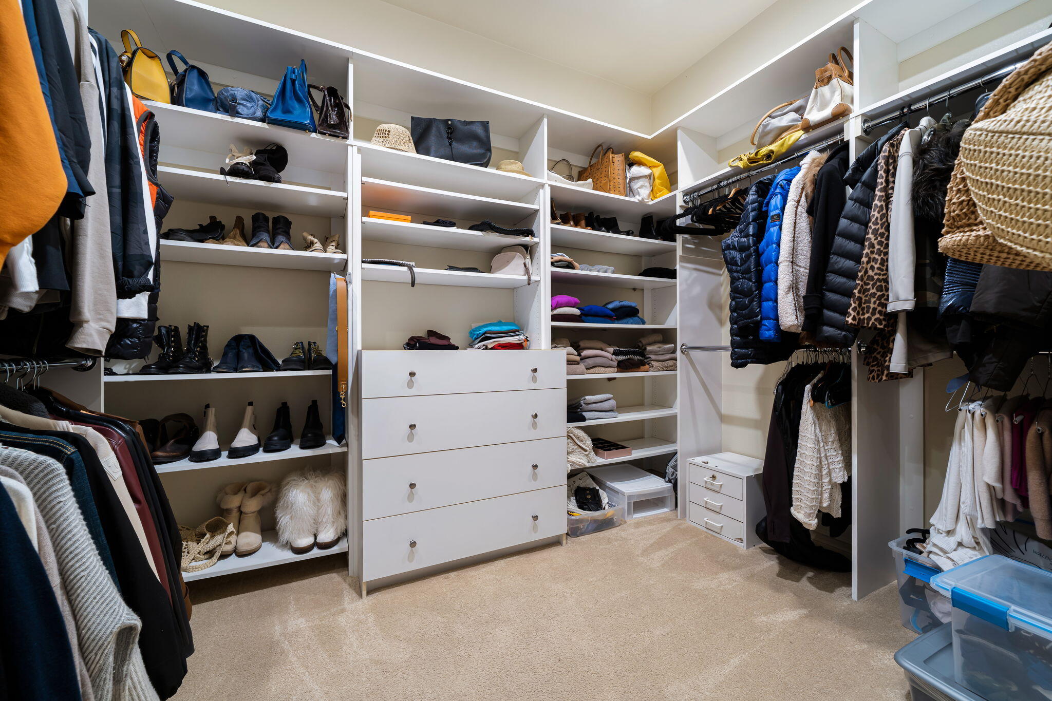 103 Waterford Circle Rancho Mirage, CA 92270 - Photo 37 of 44 a view of walk in closet with clothes and shoes