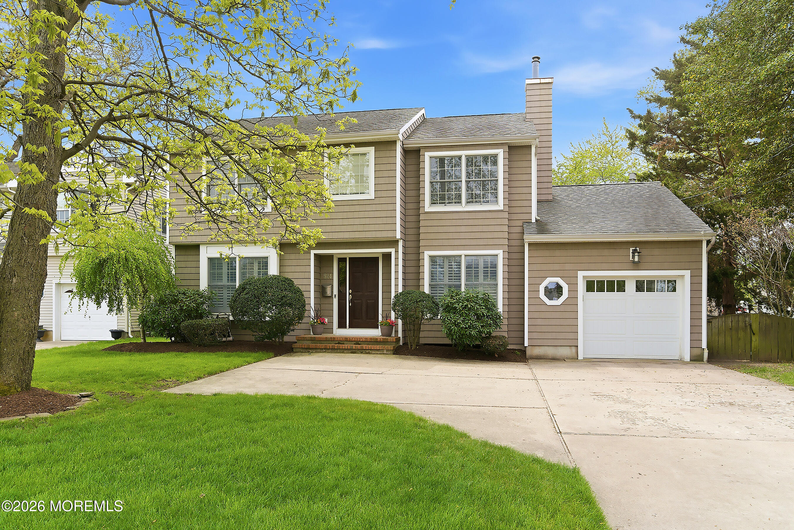 924 Ocean Road Point Pleasant, NJ 08742 - Photo 1 of 56 front view of a house with a yard