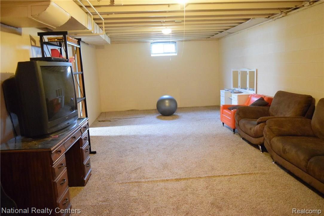 66435 Powell Road Washington, MI 48095 - Photo 17 of 22 partially finished basement!
