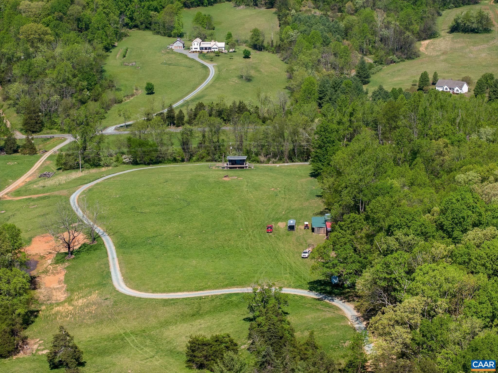 1671 Dudley Mountain Road Charlottesville, VA 22903 - Photo 43 of 60 an aerial view of a tennis court