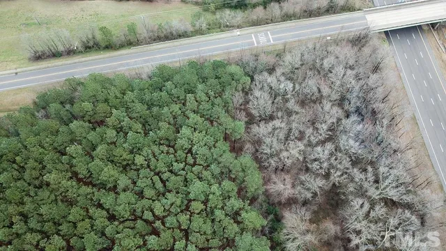 a view of a houses with a yard