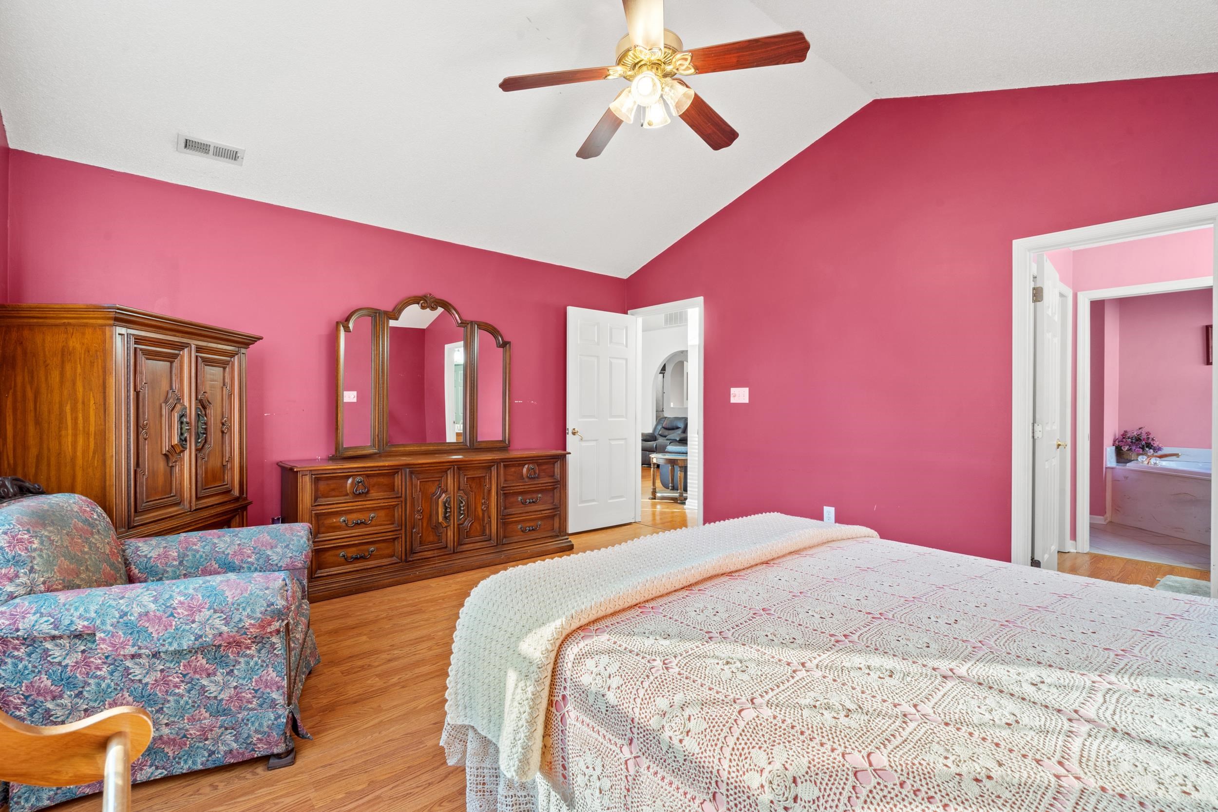 3106 Robyn Court Little River, SC 29566 - Photo 15 of 37 Bedroom with light wood finished floors, lofted ceiling, and a ceiling fan