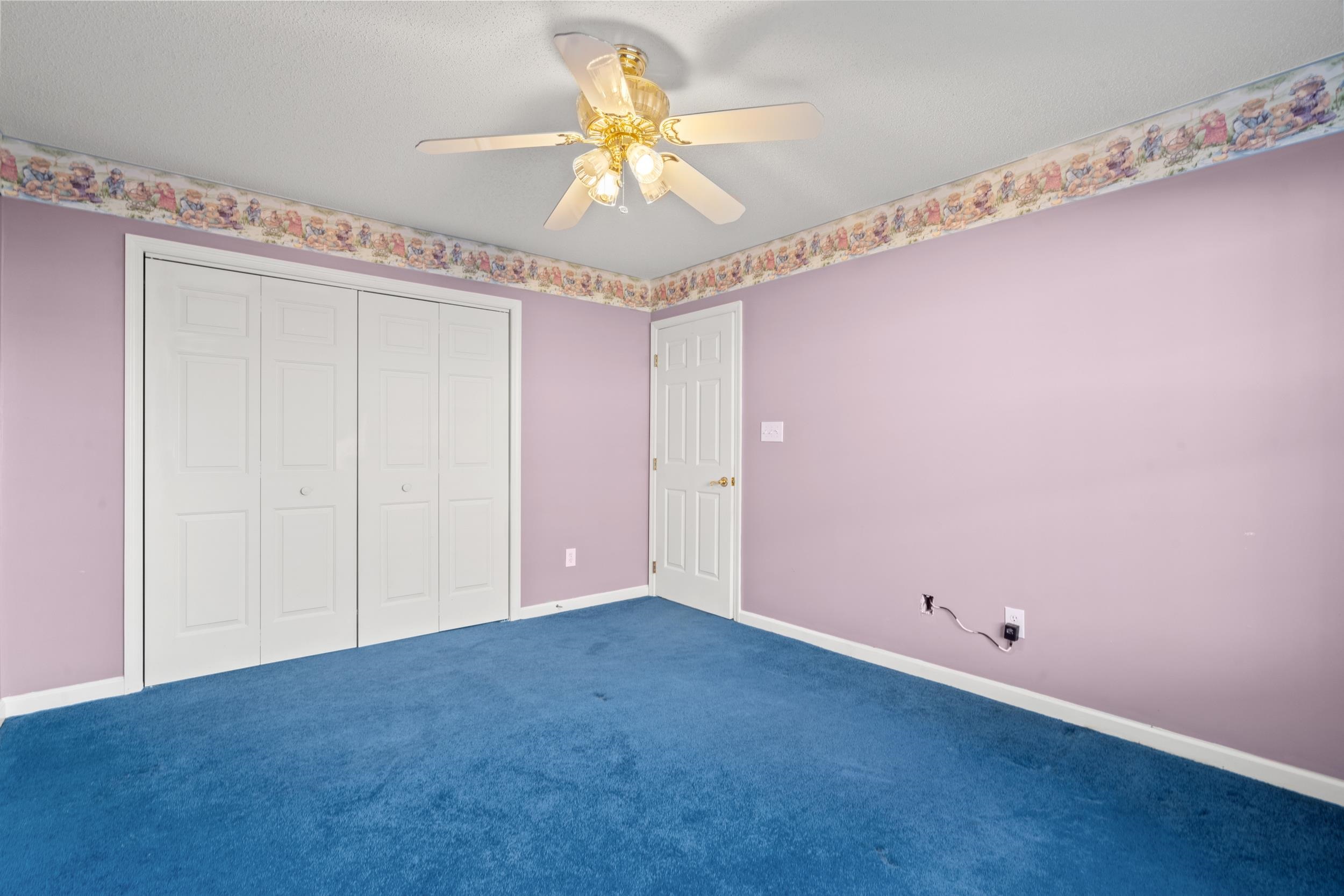 3106 Robyn Court Little River, SC 29566 - Photo 25 of 37 Unfurnished bedroom with carpet flooring, a ceiling fan, and a closet