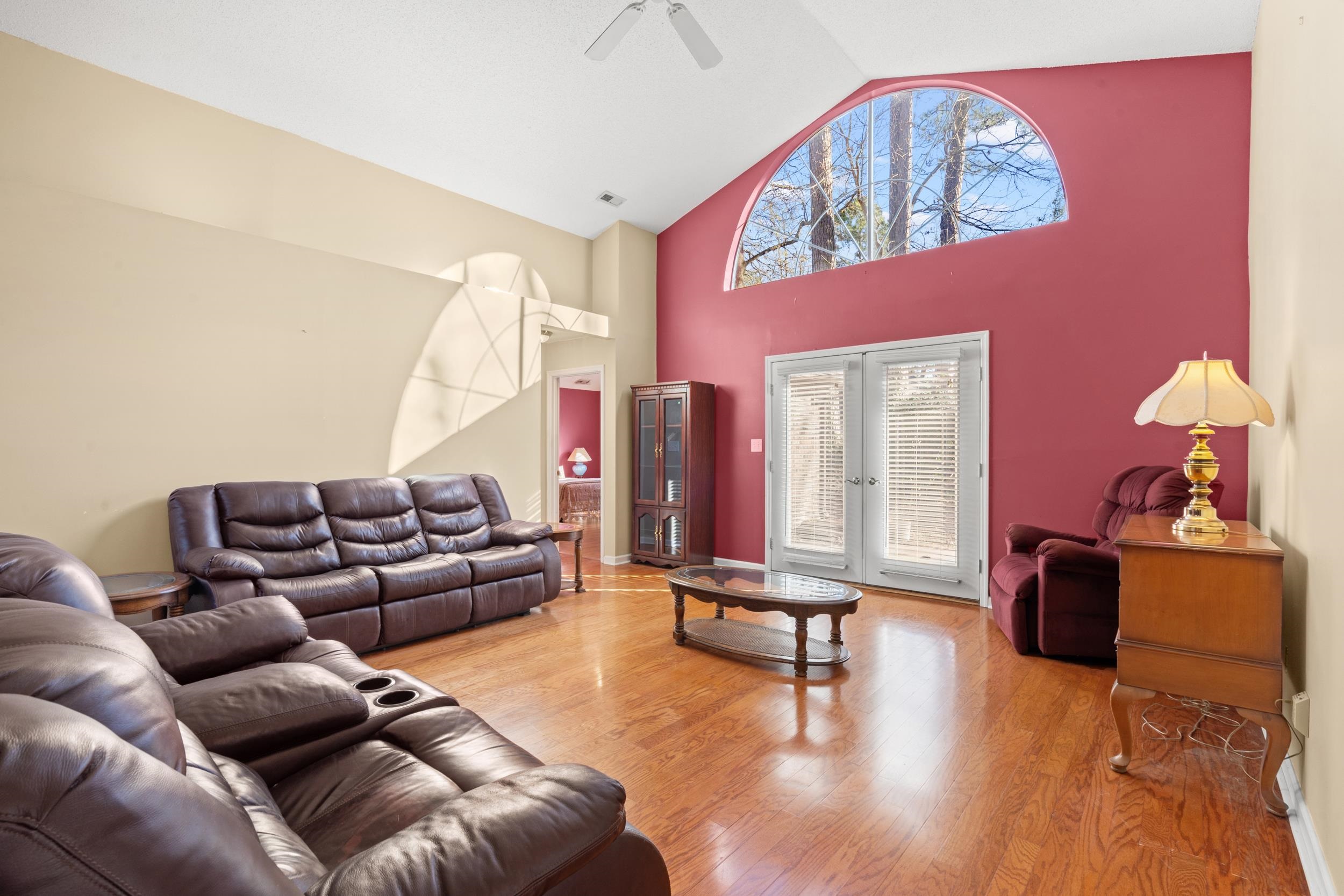 3106 Robyn Court Little River, SC 29566 - Photo 6 of 37 Living room with wood finished floors, a ceiling fan, and high vaulted ceiling