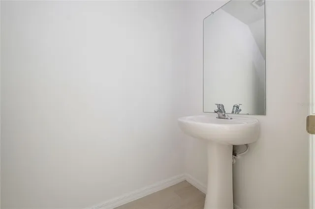 a view of a hallway with staircase