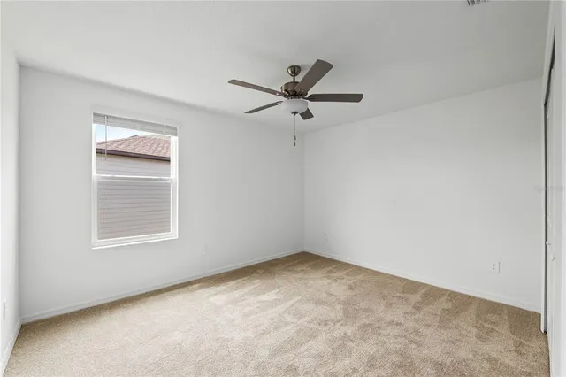 a bathroom with a double vanity sink and mirror