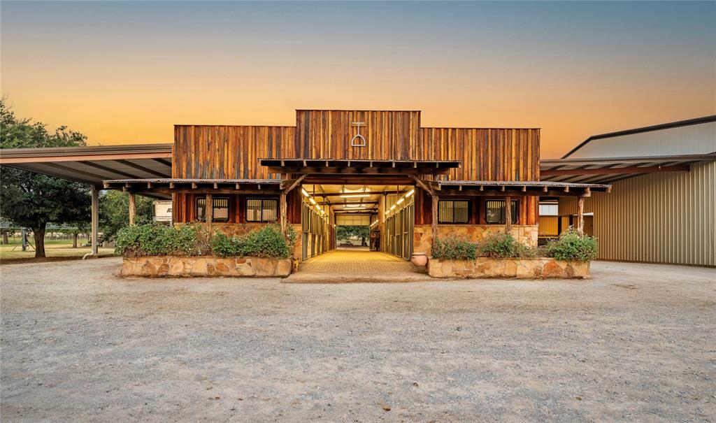 990 Farm To Market 113 Weatherford, TX 76088 - Photo 19 of 37 a view of a house with wooden fence