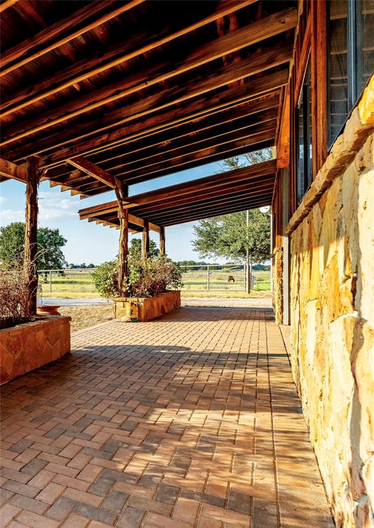 990 Farm To Market 113 Weatherford, TX 76088 - Photo 21 of 37 a view of swimming pool with an outdoor seating