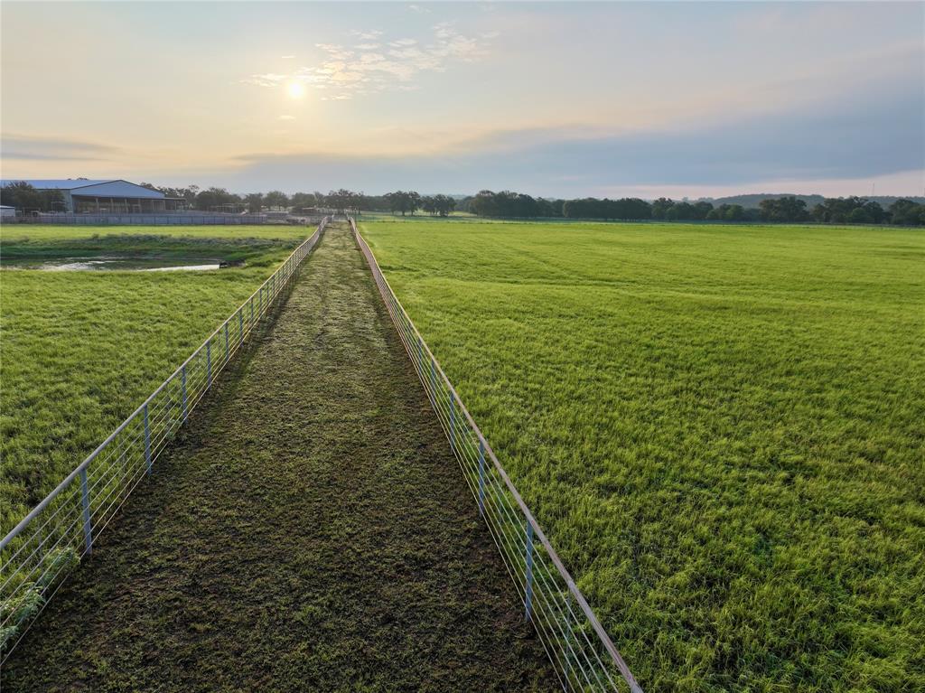 990 Farm To Market 113 Weatherford, TX 76088 - Photo 29 of 37 a view of a lake with a big yard