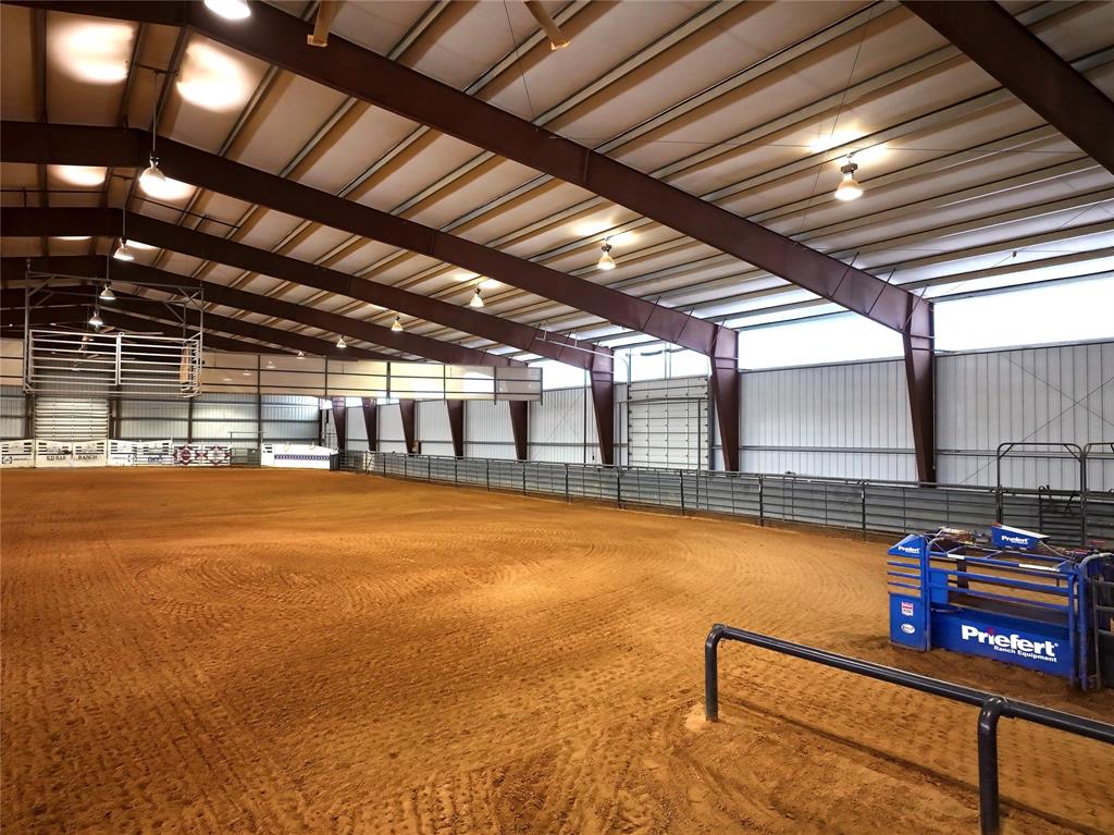 990 Farm To Market 113 Weatherford, TX 76088 - Photo 3 of 37 a view of a room with gym equipment