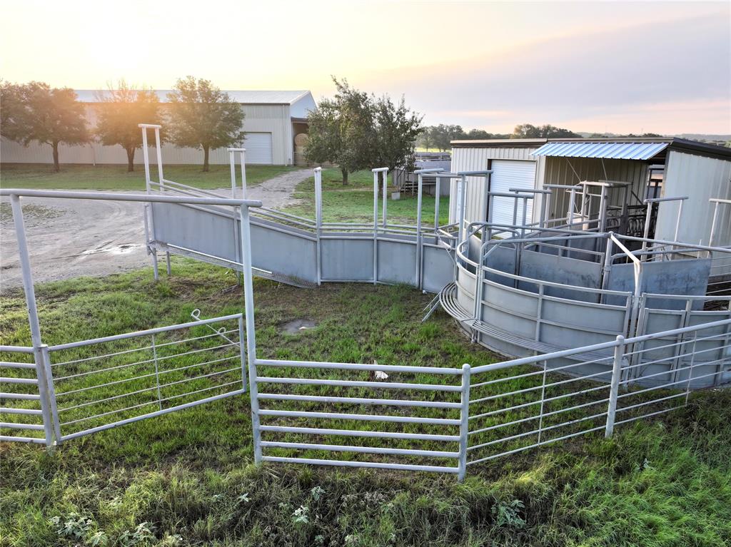 990 Farm To Market 113 Weatherford, TX 76088 - Photo 32 of 37 a view of a house with a backyard