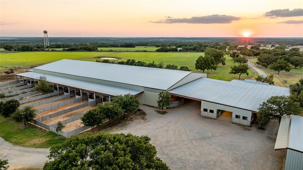 990 Farm To Market 113 Weatherford, TX 76088 - Photo 36 of 37 an aerial view of a house with a garden and lake view