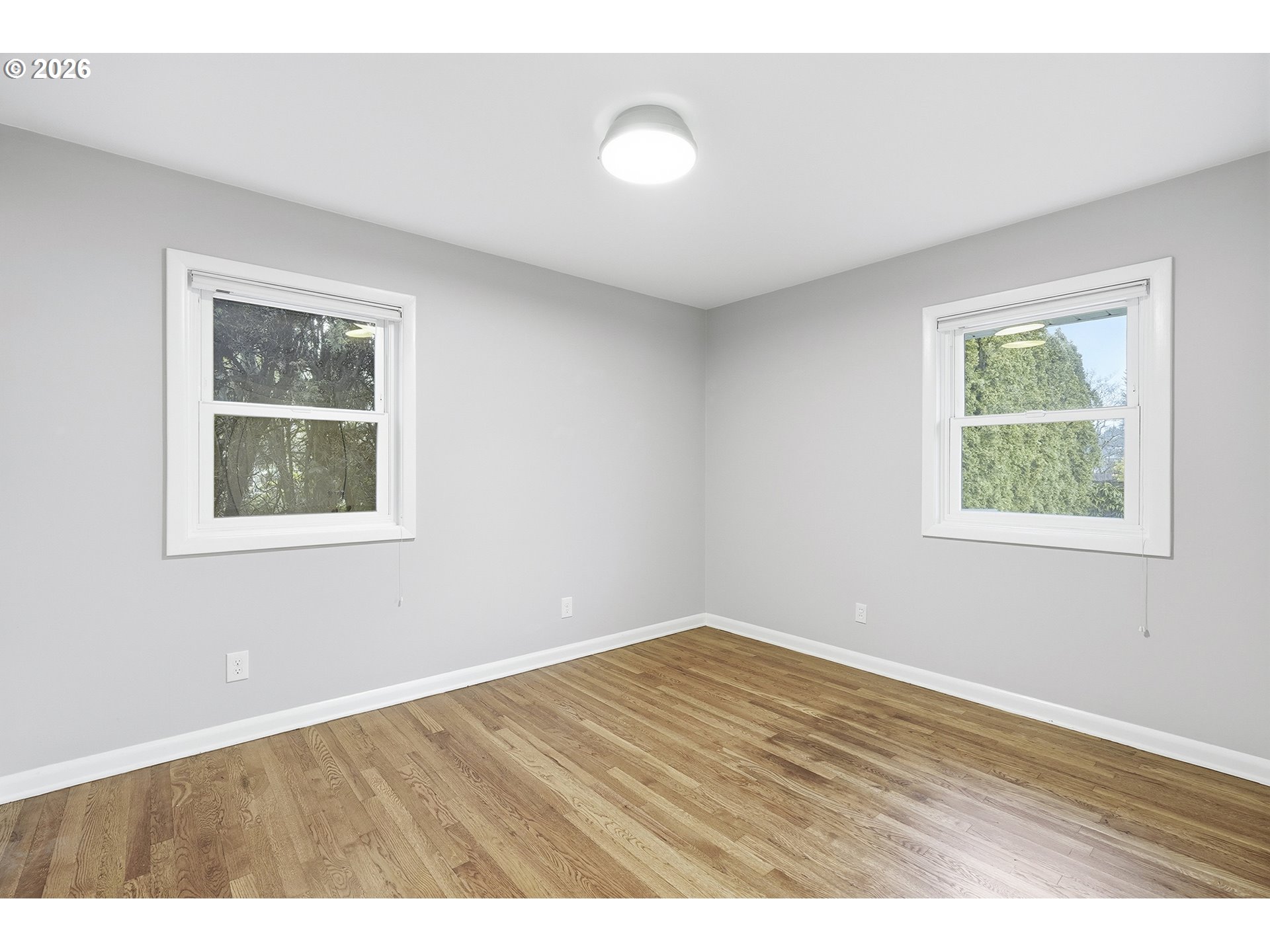 6123 Northeast Halsey Street Portland, OR 97213 - Photo 19 of 46 an empty room with a window