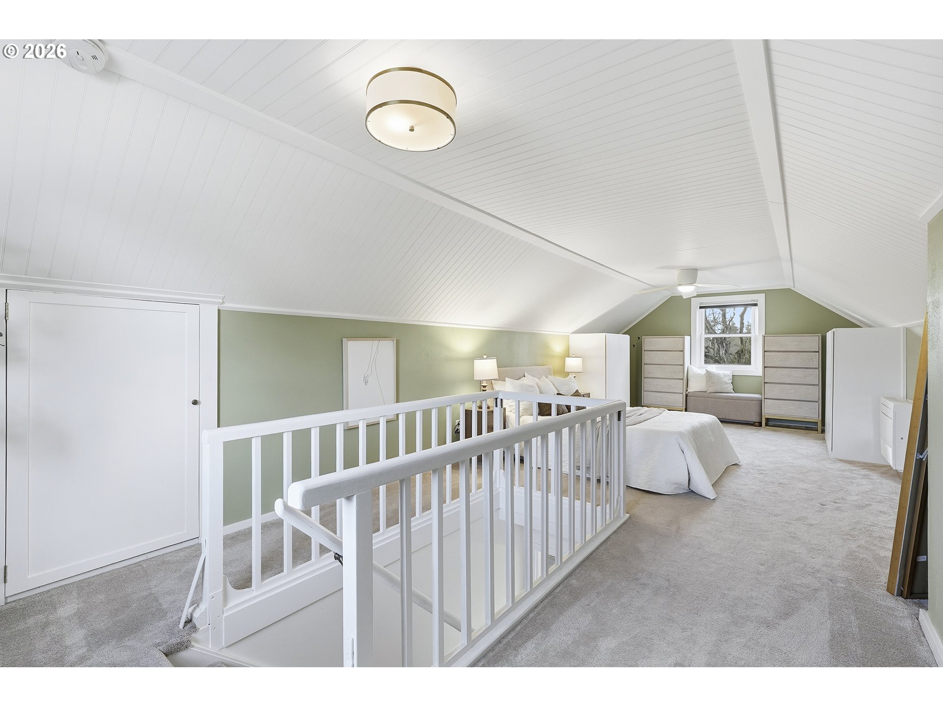 6123 Northeast Halsey Street Portland, OR 97213 - Photo 23 of 46 a bedroom with furniture and wooden floor