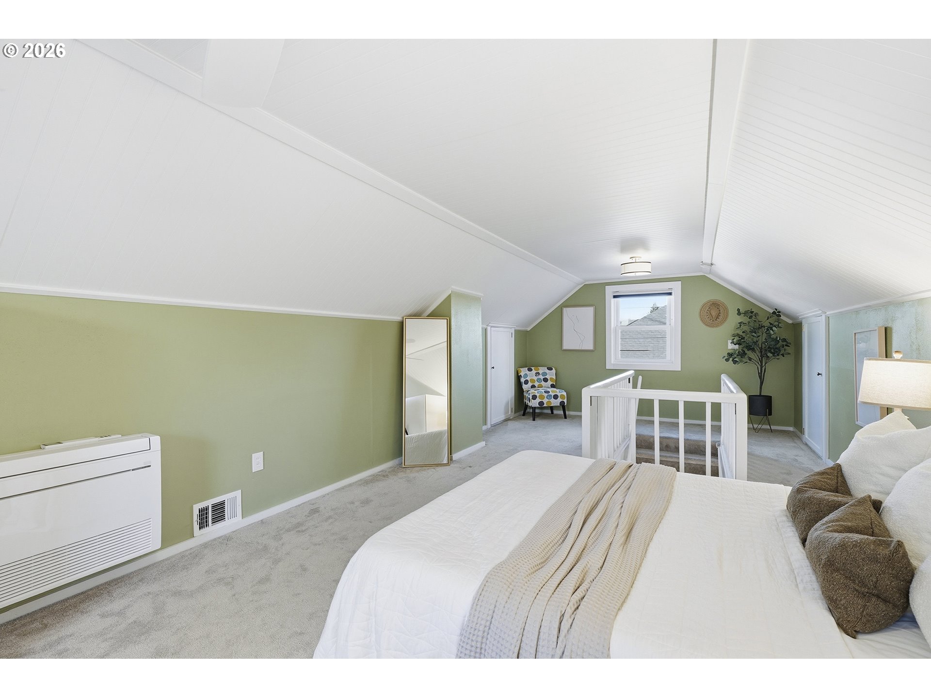 6123 Northeast Halsey Street Portland, OR 97213 - Photo 27 of 46 a bedroom with a bed window and a table