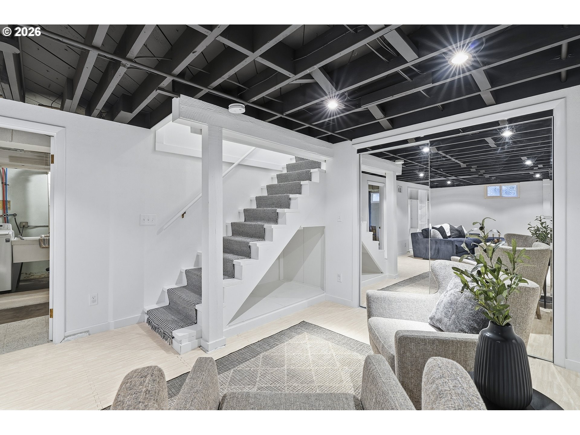 6123 Northeast Halsey Street Portland, OR 97213 - Photo 28 of 46 a living room with furniture and a potted plant