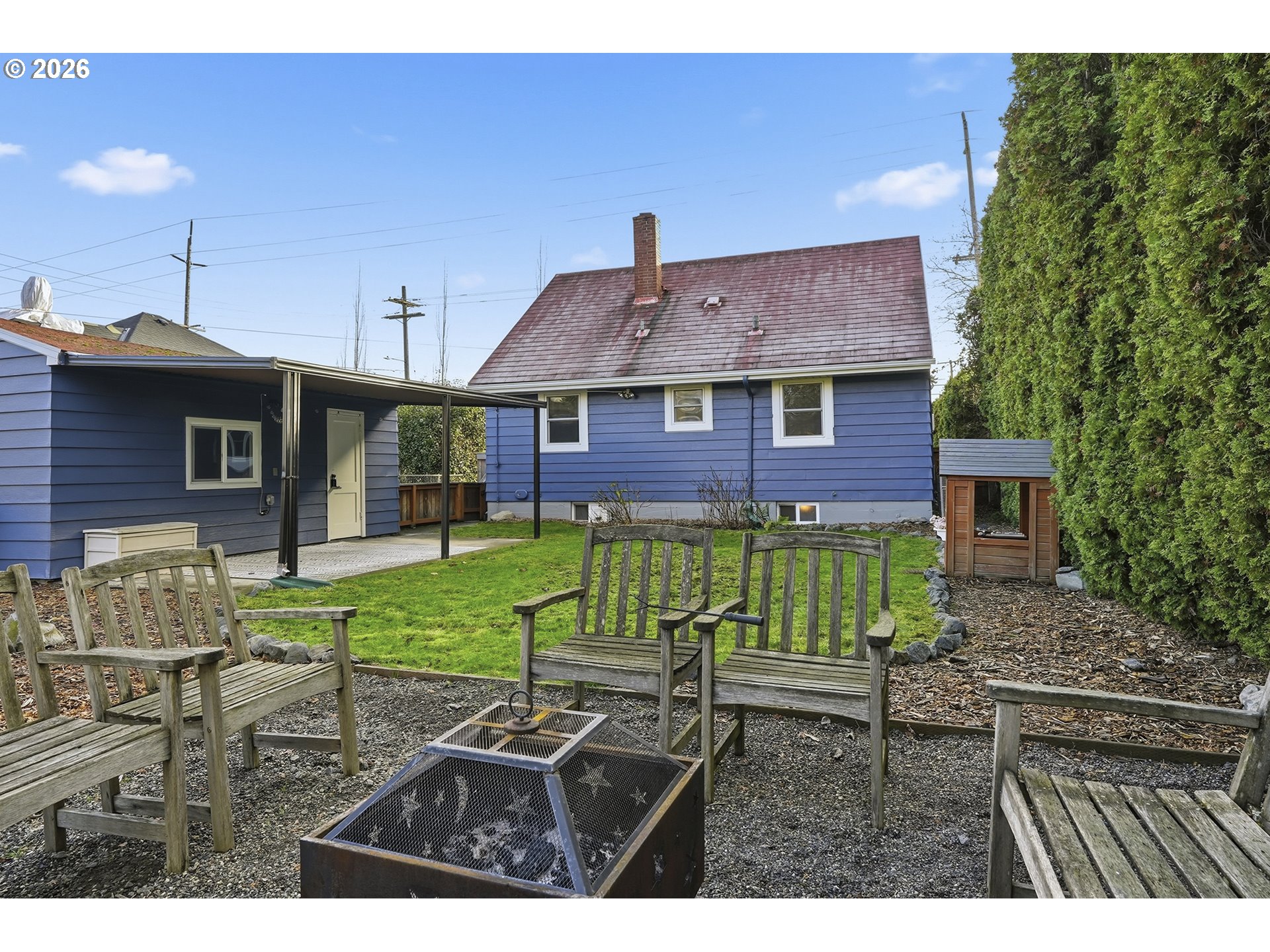 6123 Northeast Halsey Street Portland, OR 97213 - Photo 44 of 46 a view of a house with a backyard