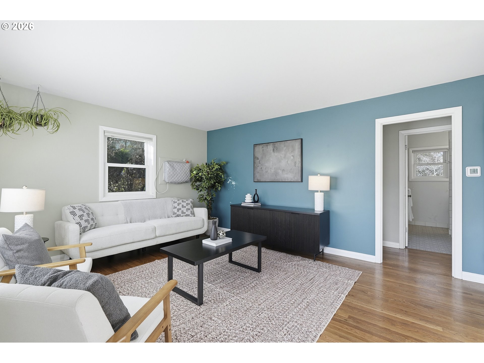 6123 Northeast Halsey Street Portland, OR 97213 - Photo 6 of 46 a living room with furniture and a window