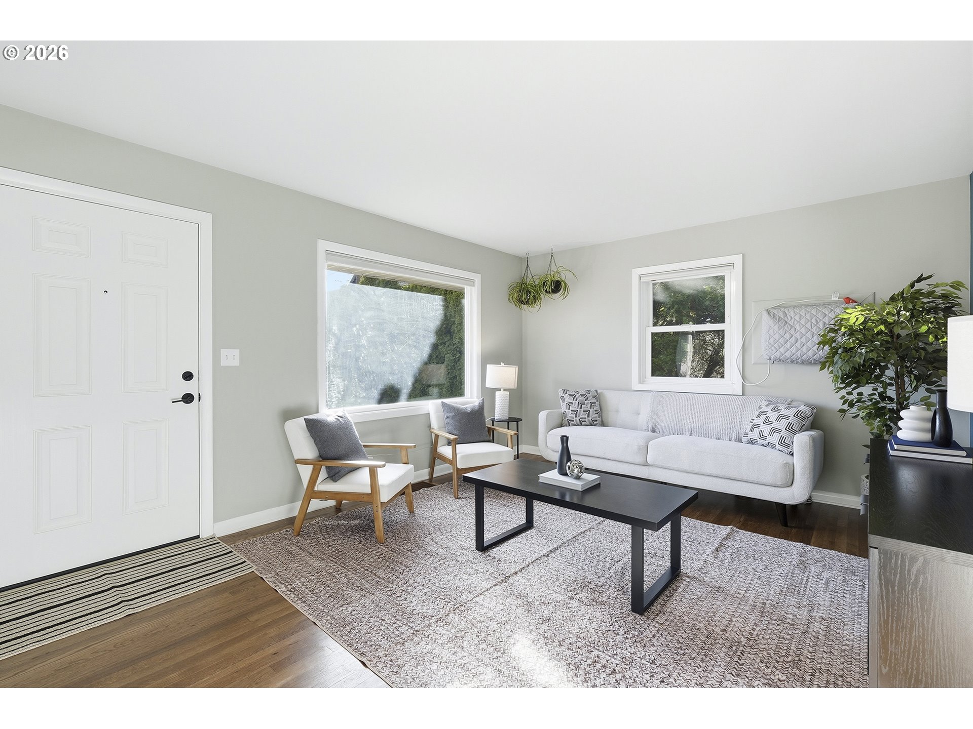 6123 Northeast Halsey Street Portland, OR 97213 - Photo 8 of 46 a living room with furniture and a window