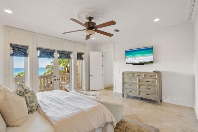 a bedroom with bed and window