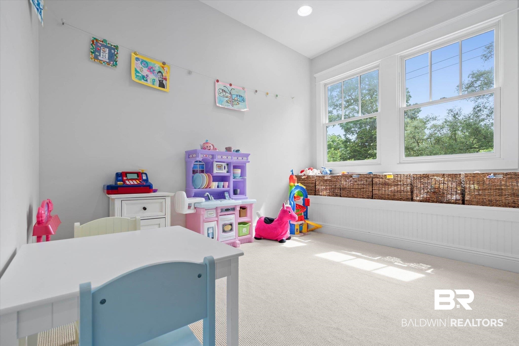 3813 Austill Lane Mobile, AL 36608 - Photo 17 of 37 Bright room with two large windows, a built-in window bench, and light-toned carpeting