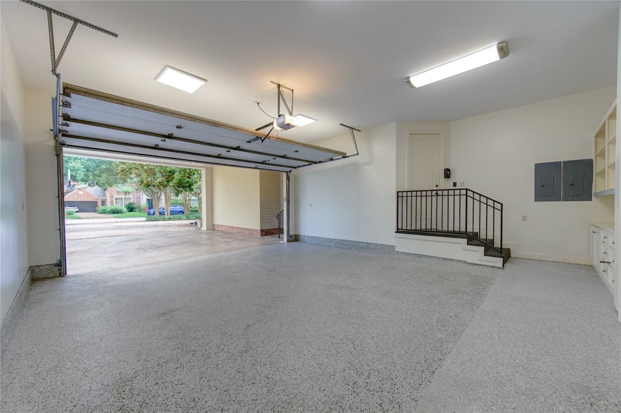 4615 Laurel Street Bellaire, TX 77401 - Photo 44 of 48 Another view of this oversized garage and attached Porte cochere. Loads of parking for ALL!