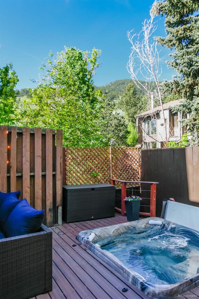 1633 4th Street, Unit C Boulder, CO 80302 - Photo 15 of 40 a wooden bench sitting in front of a building