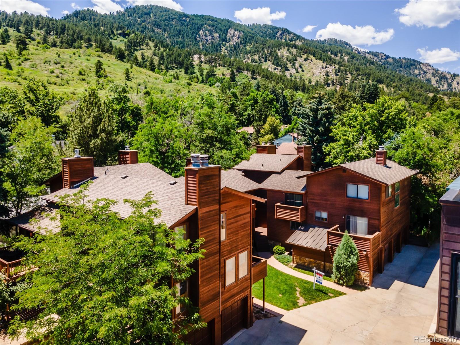 1633 4th Street, Unit C Boulder, CO 80302 - Photo 2 of 40 an aerial view of a house with a yard and trees