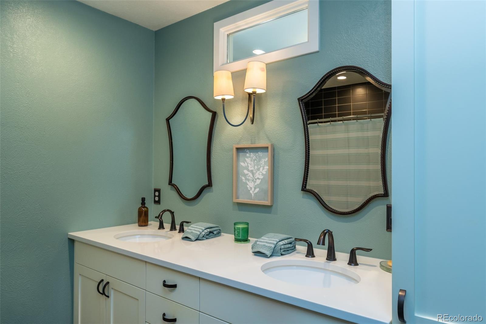 1633 4th Street, Unit C Boulder, CO 80302 - Photo 22 of 40 a bathroom with a sink and a mirror