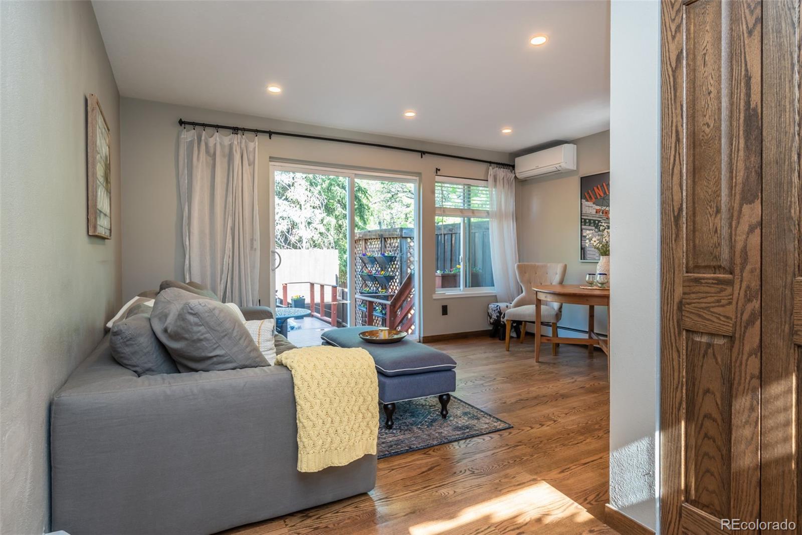 1633 4th Street, Unit C Boulder, CO 80302 - Photo 6 of 40 a living room with furniture and a large window
