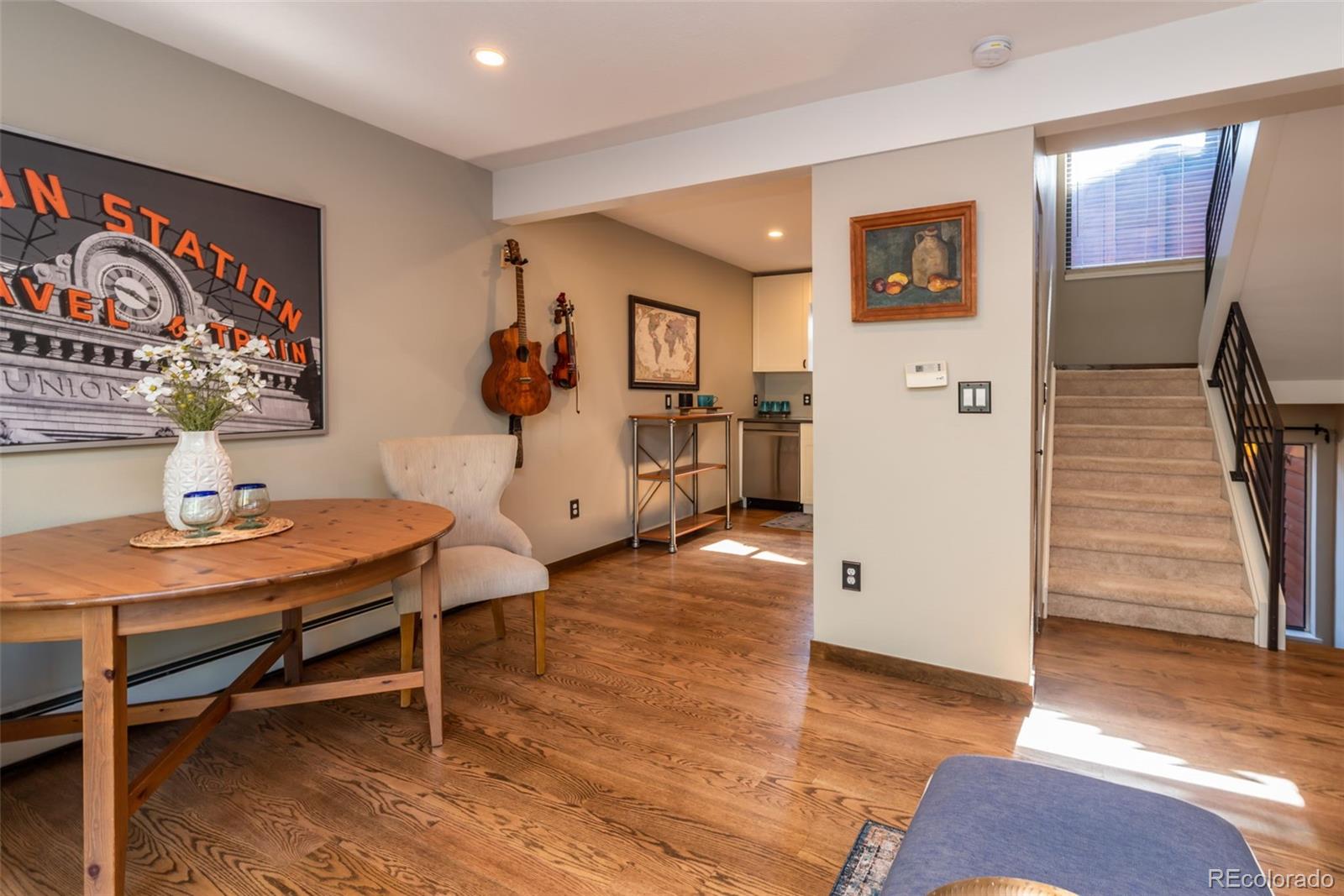 1633 4th Street, Unit C Boulder, CO 80302 - Photo 10 of 40 a living room with furniture and a flat screen tv