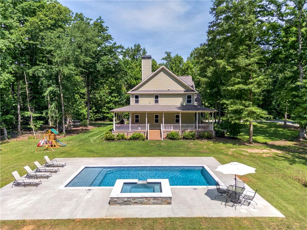 632 Geiger Road Jefferson, GA 30549 - Photo 47 of 55 a view of a house with swimming pool