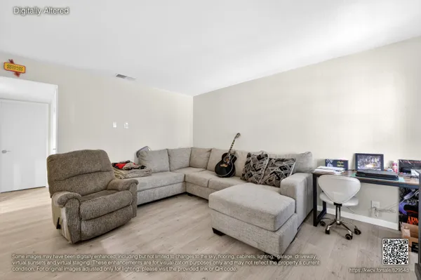 a living room with furniture and a couch