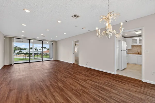 a view of a livingroom with wooden floor